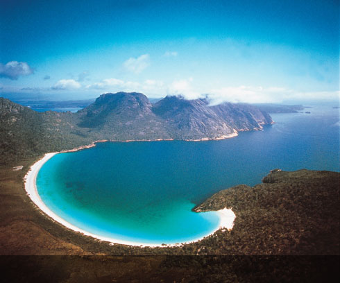 The stunning Wineglass Bay, with Coles Bay in the background to the left