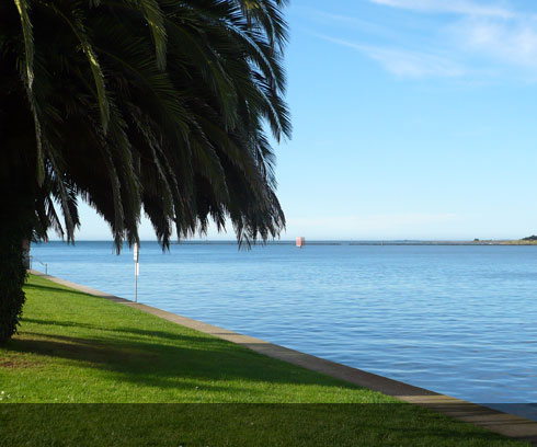 Calm safe waters of the Devonport Harbour entrance