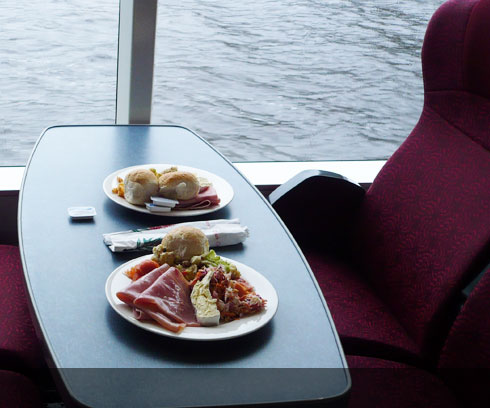 Relaxing onboard dining cruising the Gordon River